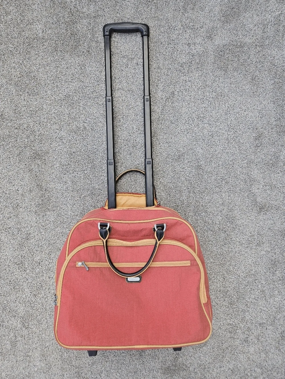BAGGALLINI TRAVEL BAG LUGGAGE ROLLING CARRY ON Suitcase Weekender Orange Rust